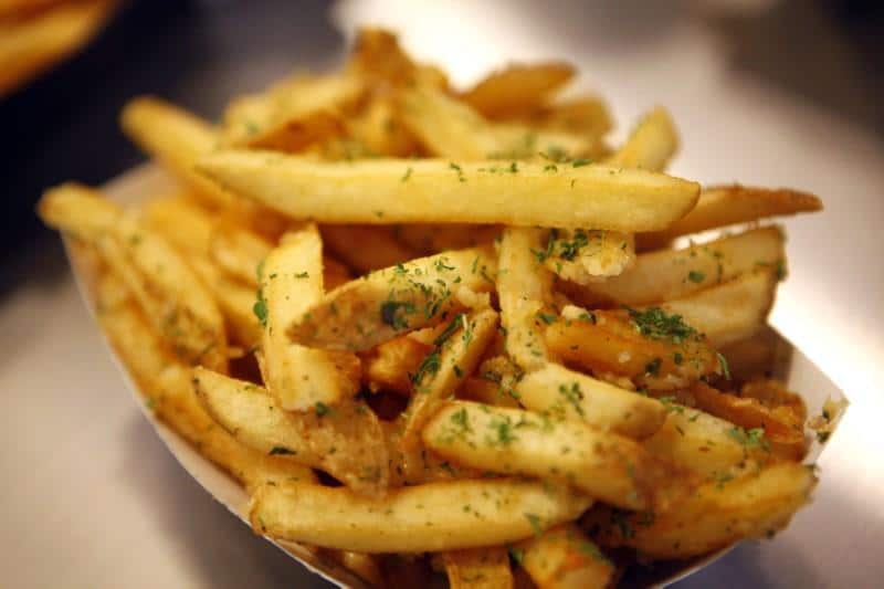 Garlic fries are displayed during a media food tour at Yankee Stadium in New York