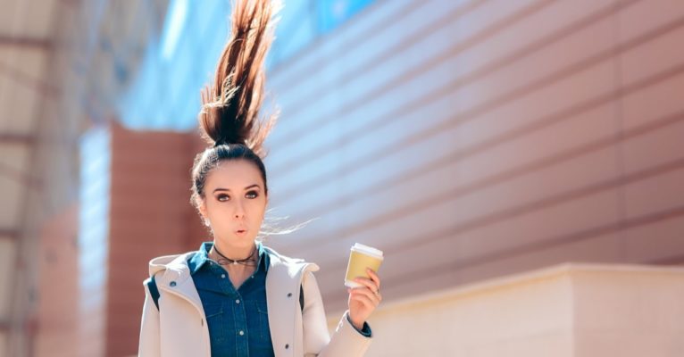 Girl with her hair standing up from caffeine